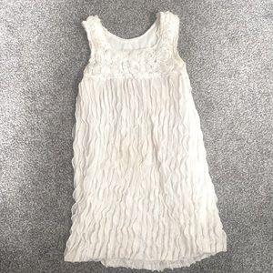 Cream colored mini dress.